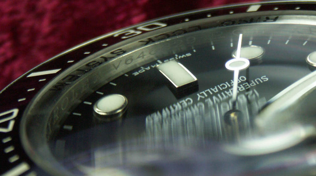 Where are the serial numbers located on a rolex watches